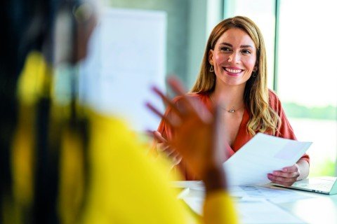 Mortgage adviser talks to her client about her options with the Marsden