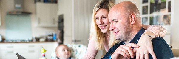 Couple read about the mortgage journey with Marsden Building Society and MAB