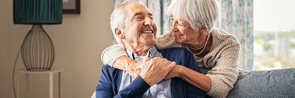 Couple smile at each other after giving the Marsden their instruction for their fixed rate bond maturity.