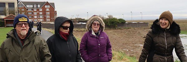 Four people enjoying a walk outside with the AFC Fylde Community Foundation