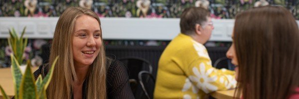 Two colleagues from the Marsden discussing workplace savings