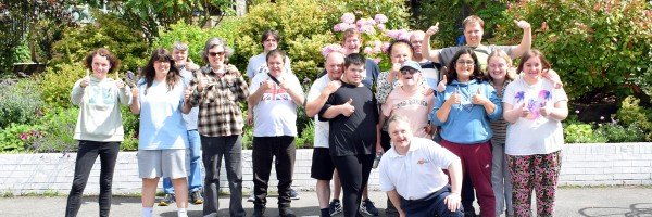 TEAM RISE Project members gather to celebrate £3,000 donation from Marsden Building Society