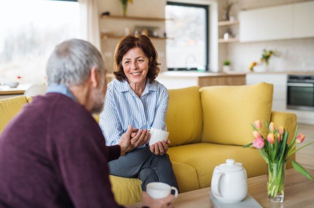 Mature woman sits in her home after applying for an Older Borrower mortgage with the Marsden, on behalf of her client.