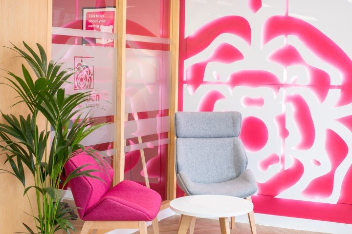 Close up of the interior of a Marsden Building Society office featuring the pink rose from their logo.