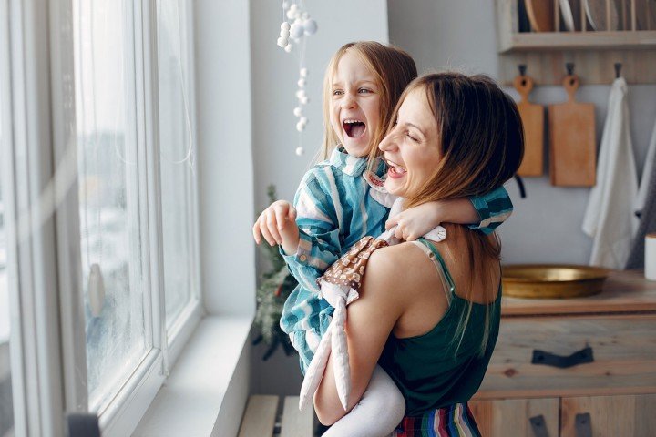 Mother spends time with her daughter after applying for an Expat Residential mortgage through Marsden Intermediaries.