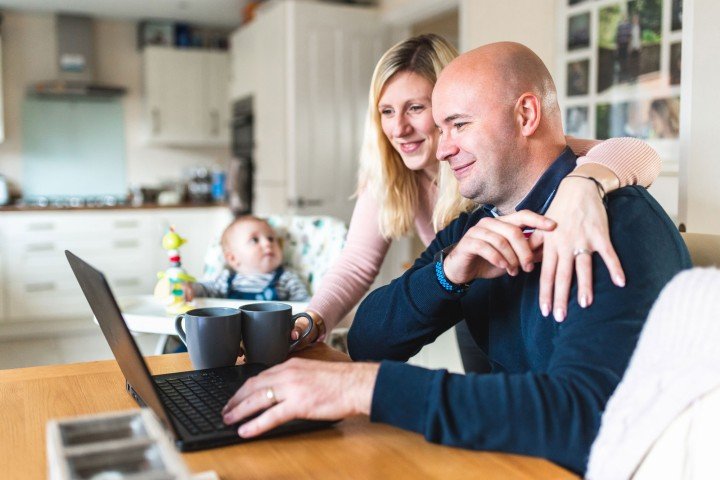 Couple with baby change their mortgage term with Marsden Building Society online