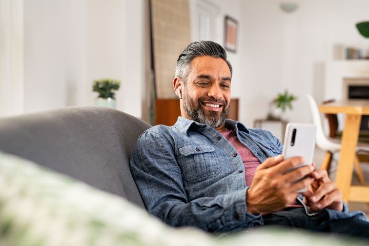 Broker browses Marsden Building Society's intermediary product range on his smartphone