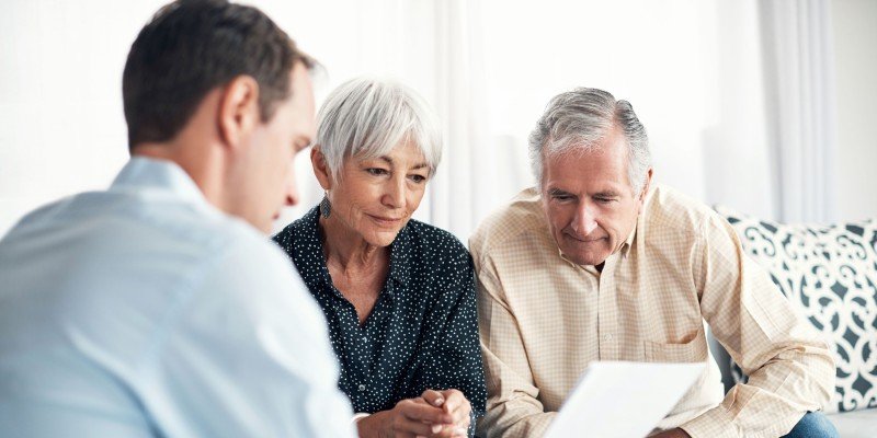 Older couple meet with an advisor to review their mortgage options